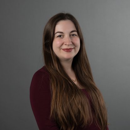 Rachel Warner smiling with red top