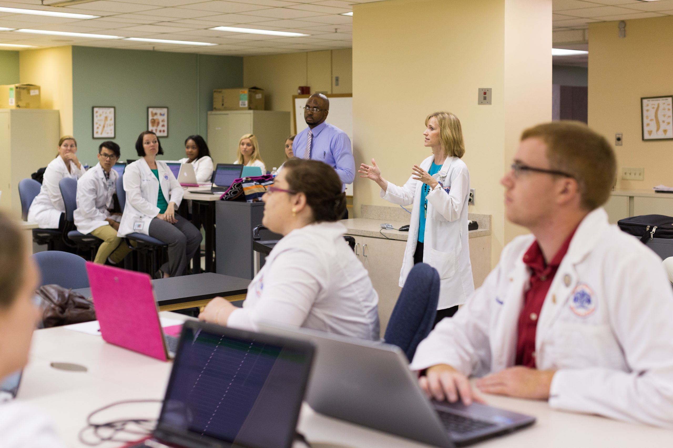 Medical students listening to a presentation